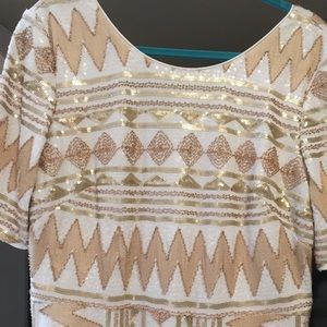 Elegant white and gold beaded dress